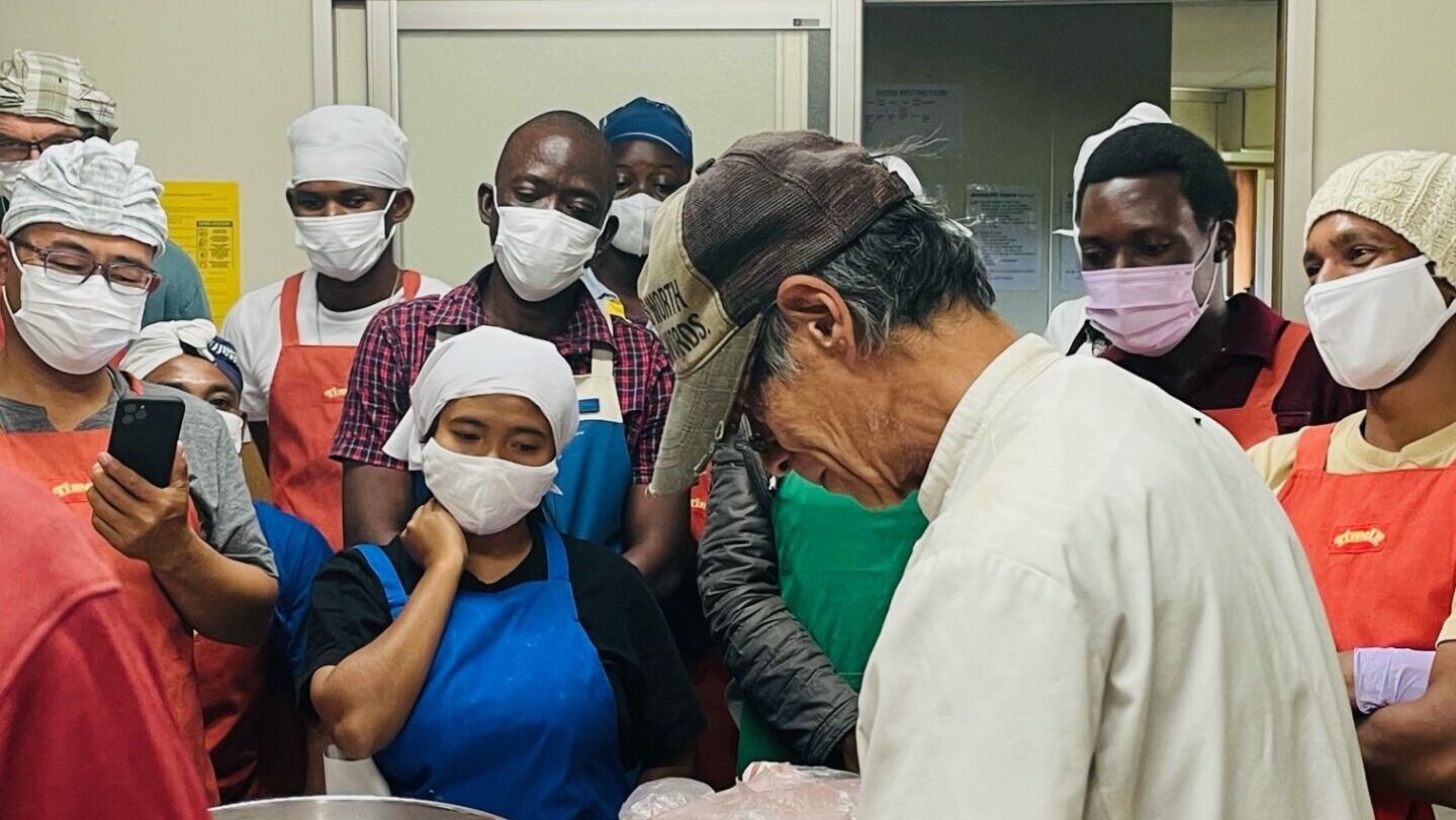 ARI Participants watch on as Koide-san, guest lecturer at ARI, is focused on demonstrating the process of making sausages.